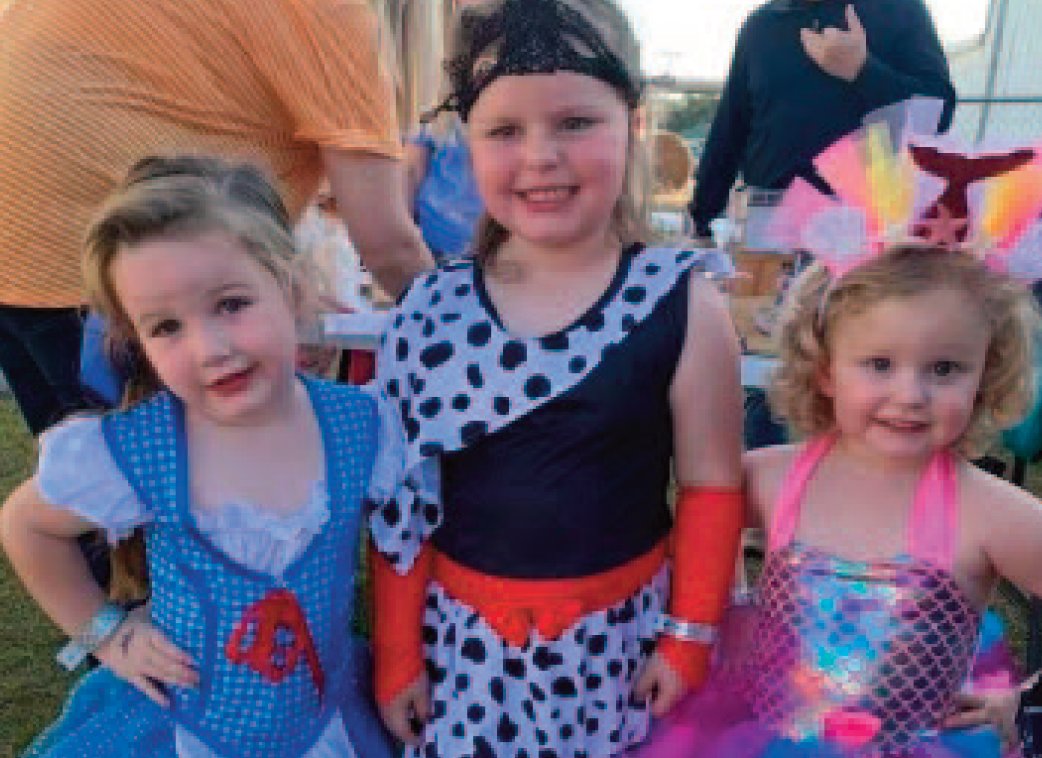 Cousins Mary Catherine Calvert, Ruby Kate Calvert, and Emma Calvert were all dressed up and having a blast at the fall festival hosted by Kemper Academy.